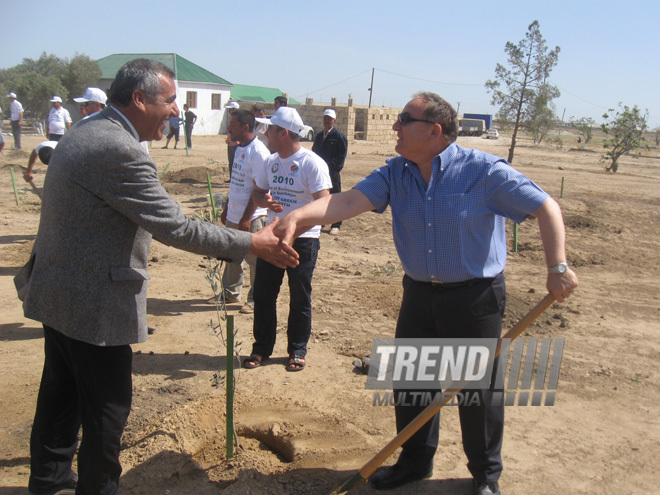 Representatives of various ministries and embassies conduct campaign on tree planting with participation of media near Heydar Aliyev airport, Baku, Azerbaijan, June 3, 2010