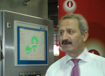 Turkish State Minister for Foreign Trade Zafar Chaglayan attends opening of a new production line at “Coca-Cola İçecek” Enterprise, Baku, Azerbaijan, Jule 29, 2010 