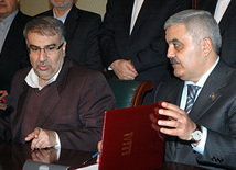 Azerbaijan, Iran sign contract on gas supplies, NIGEC General Director Javad Oji, SOCAR President Rovnag Abdullayev, Baku, Azerbaijan, Jan.12, 2011