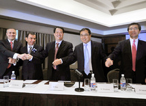 Signing of agreement on construction of cement plant Gizildash Cement in Baku by Azerbaijani Company Norm and the Chinese contracting company China Triumph International Engineering Co ltd (CTIE), Norm Deputy Director Mammad Abbasov, Norm CEO Ismayil Erkovan, CTIE Chairman Peng Shou, Baku, Azerbaijan, Marc 01, 2011