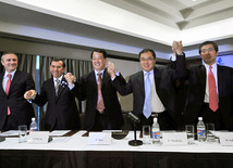 Signing of agreement on construction of cement plant Gizildash Cement in Baku by Azerbaijani Company Norm and the Chinese contracting company China Triumph International Engineering Co ltd (CTIE), Norm Deputy Director Mammad Abbasov, Norm CEO Ismayil Erkovan, CTIE Chairman Peng Shou, Baku, Azerbaijan, Marc 01, 2011