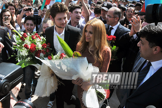 Eurovision-2011 Winners Eldar Gasimov and Nigar Jamal laid flowers at monument to National Leader Heydar Aliyev, Baku, Azerbaijan, May 16, 2011
