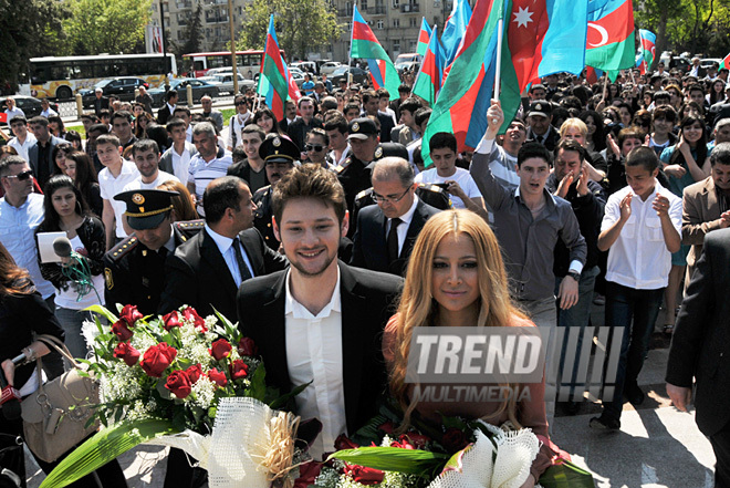 Eurovision-2011 Winners Eldar Gasimov and Nigar Jamal laid flowers at monument to National Leader Heydar Aliyev, Baku, Azerbaijan, May 16, 2011
