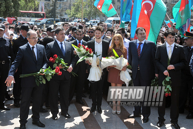 Eurovision-2011 Winners Eldar Gasimov and Nigar Jamal laid flowers at monument to National Leader Heydar Aliyev, Baku, Azerbaijan, May 16, 2011
