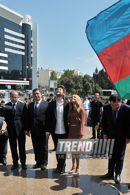 Eurovision-2011 Winners Eldar Gasimov and Nigar Jamal laid flowers at monument to National Leader Heydar Aliyev, Baku, Azerbaijan, May 16, 2011
