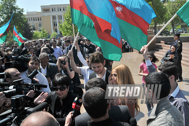 Eurovision-2011 Winners Eldar Gasimov and Nigar Jamal laid flowers at monument to National Leader Heydar Aliyev, Baku, Azerbaijan, May 16, 2011
