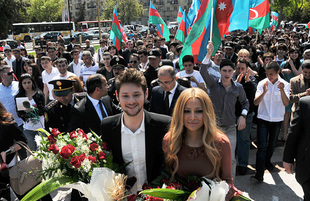 Eurovision-2011 Winners Eldar Gasimov and Nigar Jamal laid flowers at monument to National Leader Heydar Aliyev, Baku, Azerbaijan, May 16, 2011
