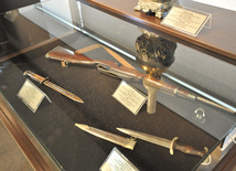 Dagger are transferred from father to son, Gala, Azerbaijan, September 9, 2011