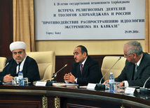 The academic conference "Preventing the spread of extremist ideology in the Caucasus", the Chairman of the Caucasus Muslims Office Sheik-ul-Islam Haji Allahshukur Pashazade, 
Azerbaijani Presidential Administration Social and Political Department Chief Ali Hasanov. Baku, Azerbaijan, Sept.29, 2011 