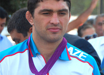 Sərbəst güləş üzrə olimpiya çempionu olmuş Şərif Şərifov. Bakı, Azərbaycan, 15 avqust 2012