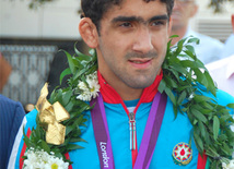 Sərbəst güləş üzrə olimpiya çempionu Toğrul Əsgərov. Bakı, Azərbaycan, 15 avqust 2012