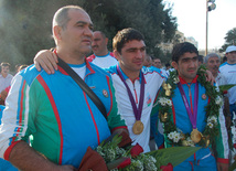 Olympic champion on wrestling Sharif Sharifov and Toghrul Asgerov. Baku, Azerbaijan, Aug.15, 2012