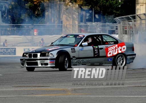 Car tricks demonstrated within the City Challenge car race in Baku. Baku, Azerbaijan, Oct.27, 2012