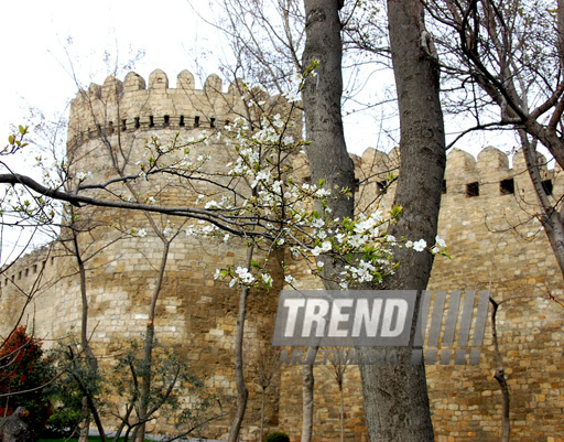 Spring with its warm breath, green costume and mist kerchief. Baku, Azerbaijan, March 28, 2013