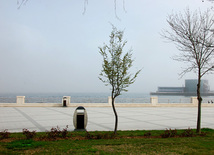 Spring with its warm breath, green costume and mist kerchief. Baku, Azerbaijan, March 28, 2013