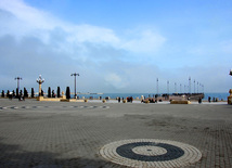 Spring with its warm breath, green costume and mist kerchief. Baku, Azerbaijan, March 28, 2013