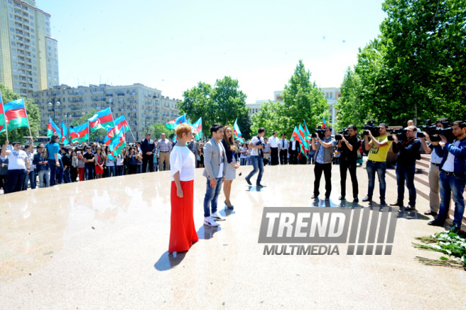 Azerbaijani participant of 'Eurovision' song contest Farid Mammadov laid flowers to the monument of the national leader Heydar Aliyev. Baku, Azerbaijan, May 21, 2013