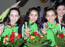 Avropa çempionatında uğur qazanan Azərbaycan gimnastları Vətənə qayıdıblar. Bakı, Azərbaycan, 03 iyun 2013