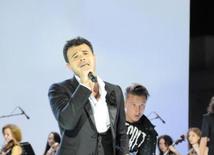 Azerbaijani famous singer and composer EMIN’s annual concert takes place in Green Theater in Baku. Azerbaijan, July 11, 2013 