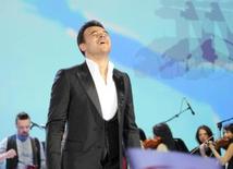 Azerbaijani famous singer and composer EMIN’s annual concert takes place in Green Theater in Baku. Azerbaijan, July 11, 2013 