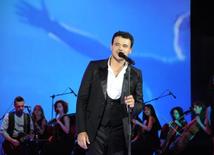 Azerbaijani famous singer and composer EMIN’s annual concert takes place in Green Theater in Baku. Azerbaijan, July 11, 2013 