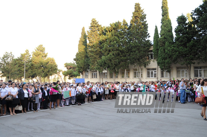 Knowledge Day is the first bells and excitements, bunch of flowers and white bows. Baku, Azerbaijan, Sept.16, 2013