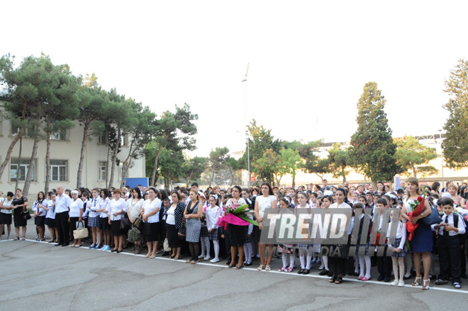 Knowledge Day is the first bells and excitements, bunch of flowers and white bows. Baku, Azerbaijan, Sept.16, 2013