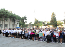 Knowledge Day is the first bells and excitements, bunch of flowers and white bows, Baku, Azerbaijan, Sept.16, 2013