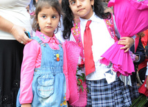 Knowledge Day is the first bells and excitements, bunch of flowers and white bows, Baku, Azerbaijan, Sept.16, 2013