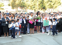 Knowledge Day is the first bells and excitements, bunch of flowers and white bows, Baku, Azerbaijan, Sept.16, 2013