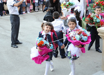 Knowledge Day is the first bells and excitements, bunch of flowers and white bows, Baku, Azerbaijan, Sept.16, 2013