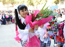 Knowledge Day is the first bells and excitements, bunch of flowers and white bows, Baku, Azerbaijan, Sept.16, 2013