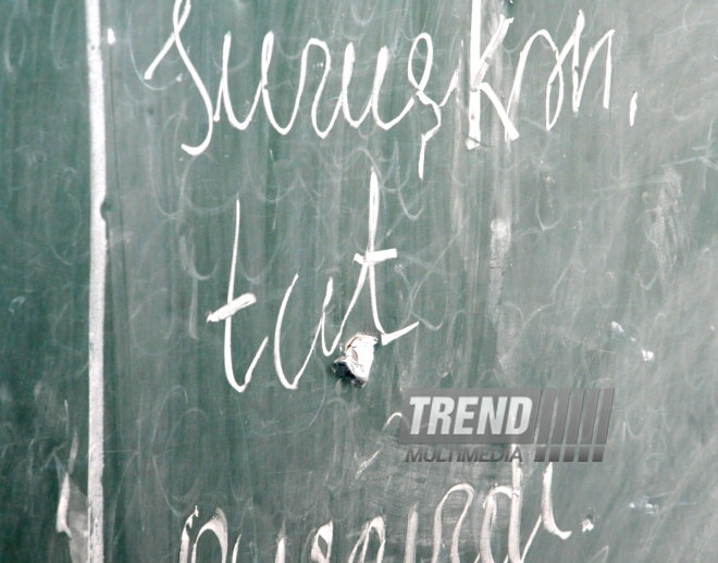 A blackboard and window hit by bullets. Tovuz, Azerbaijan, Nov.01, 2014