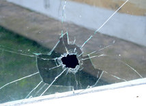 A blackboard and window hit by bullets. Tovuz, Azerbaijan, Nov.01, 2014