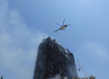 К тушению пожара был привлечен вертолет. Азербайджан, 19 мая 2015 г.