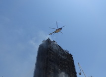 К тушению пожара был привлечен вертолет. Азербайджан, 19 мая 2015 г.