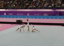 Azərbaycanın qadınlardan ibarət triosu idman akrobatikası üzrə yarışlarda final mərhələsinə çıxdı. Bakı, Azərbaycan, 17 iyun 2015