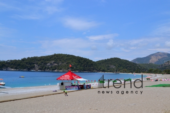 Ölüdeniz national park (Blue Lagoon) - at the intersection point of the Aegean Sea and the Mediterranean Sea. Turkey, Fethiye, June 29, 2017