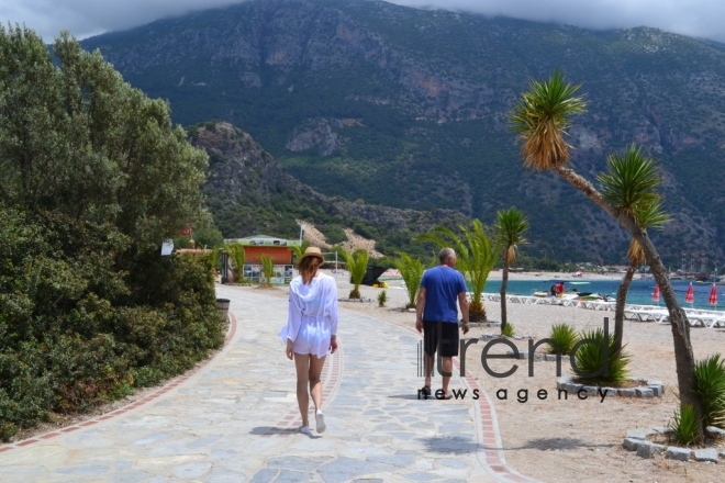 Ölüdeniz national park (Blue Lagoon) - at the intersection point of the Aegean Sea and the Mediterranean Sea. Turkey, Fethiye, June 29, 2017