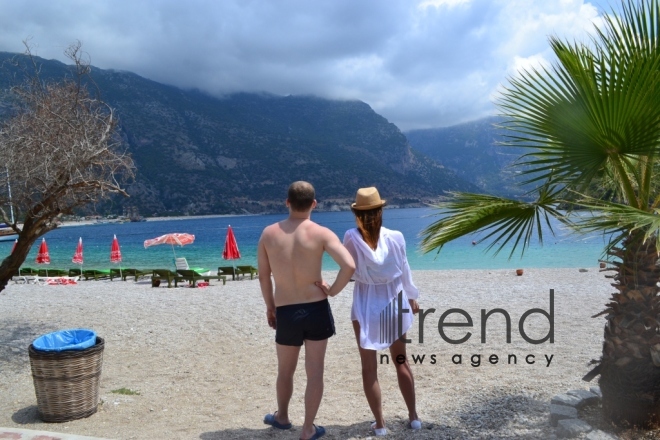 Ölüdeniz national park (Blue Lagoon) - at the intersection point of the Aegean Sea and the Mediterranean Sea. Turkey, Fethiye, June 29, 2017