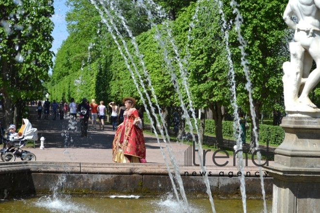 Peterhof: walking through time. St. Petersburg, Russia, July 13, 2017
