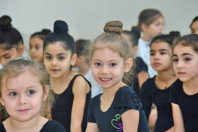 Members of Azerbaijans national rhythmic gymnastics team meet with young athletes.Azerbaijan Baku 19 december 2019