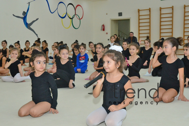 Members of Azerbaijans national rhythmic gymnastics team meet with young athletes.Azerbaijan Baku 19 december 2019