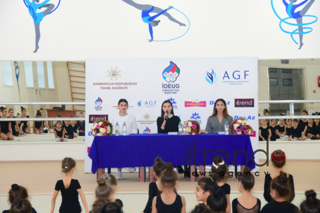 Members of Azerbaijans national rhythmic gymnastics team meet with young athletes.Azerbaijan Baku 19 december 2019